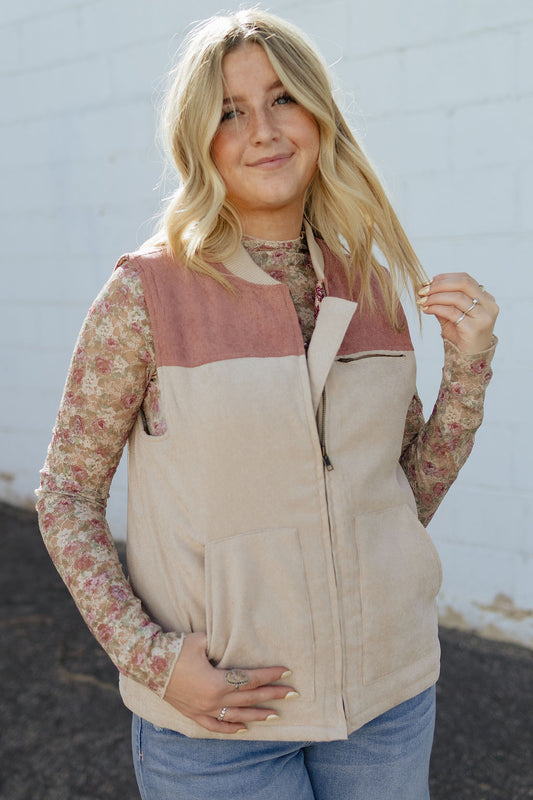 two toned puffer vest made of light corduroy and patterned lining