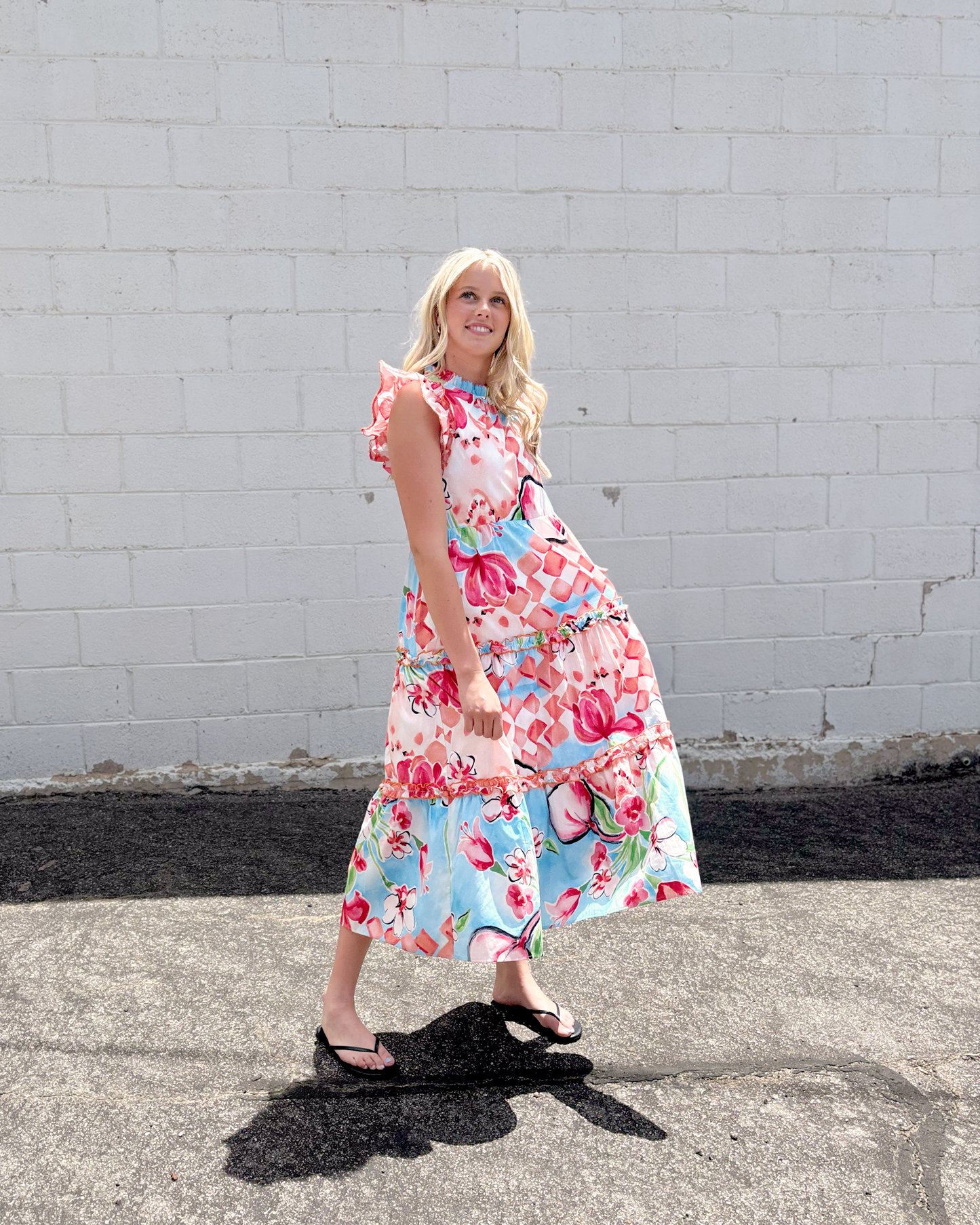 Summer sleeveless dress with large floral print in red and blue