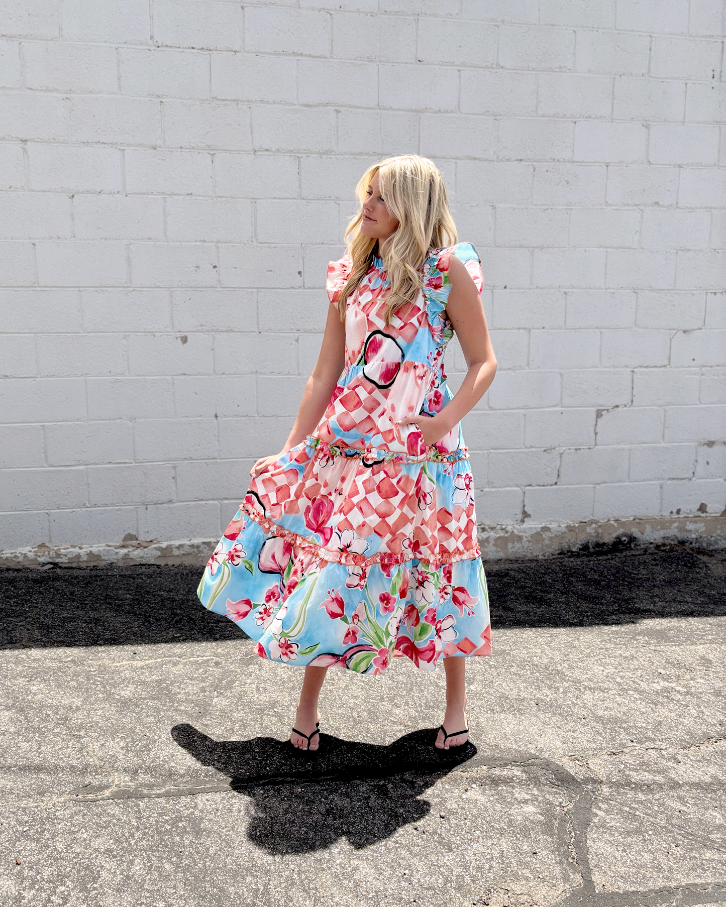 Summer sleeveless dress with large floral print in red and blue