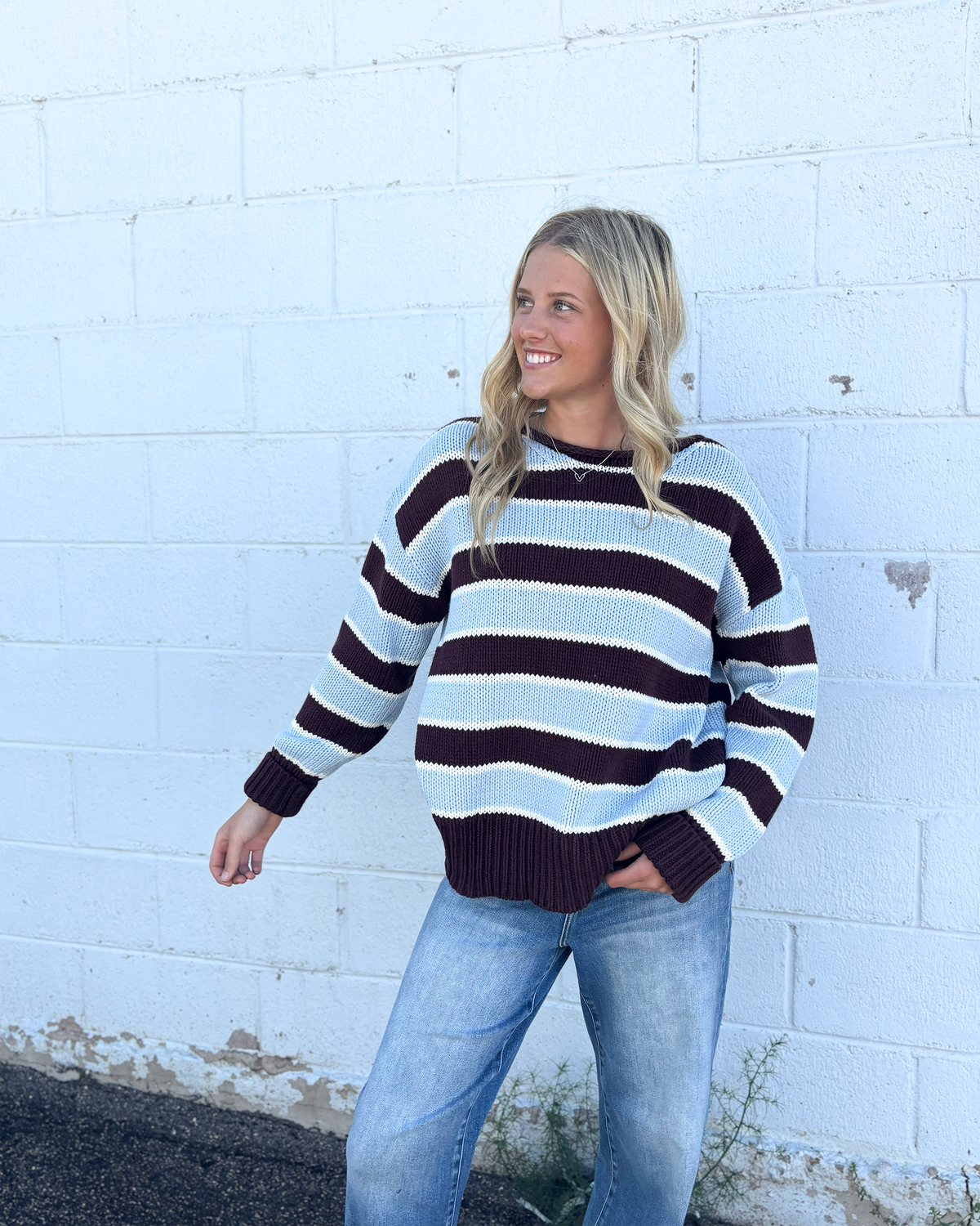 Brown and blue striped sweater with rolled neckline