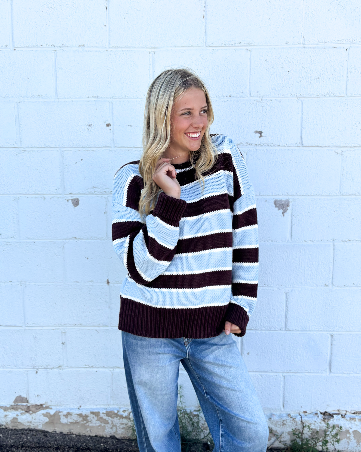 Brown and blue striped sweater with rolled neckline