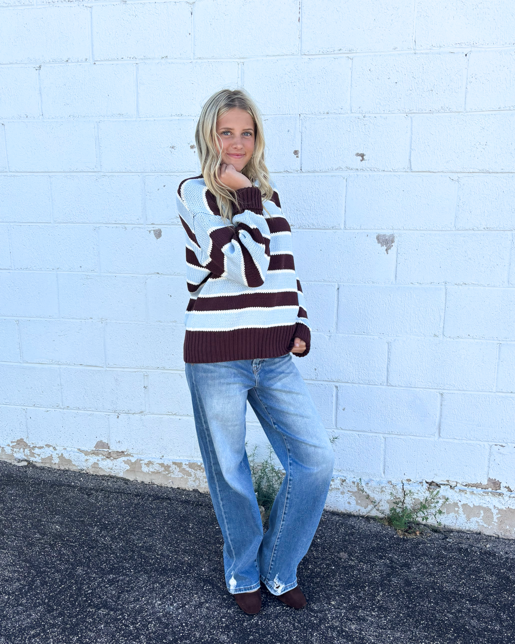Brown and blue striped sweater with rolled neckline