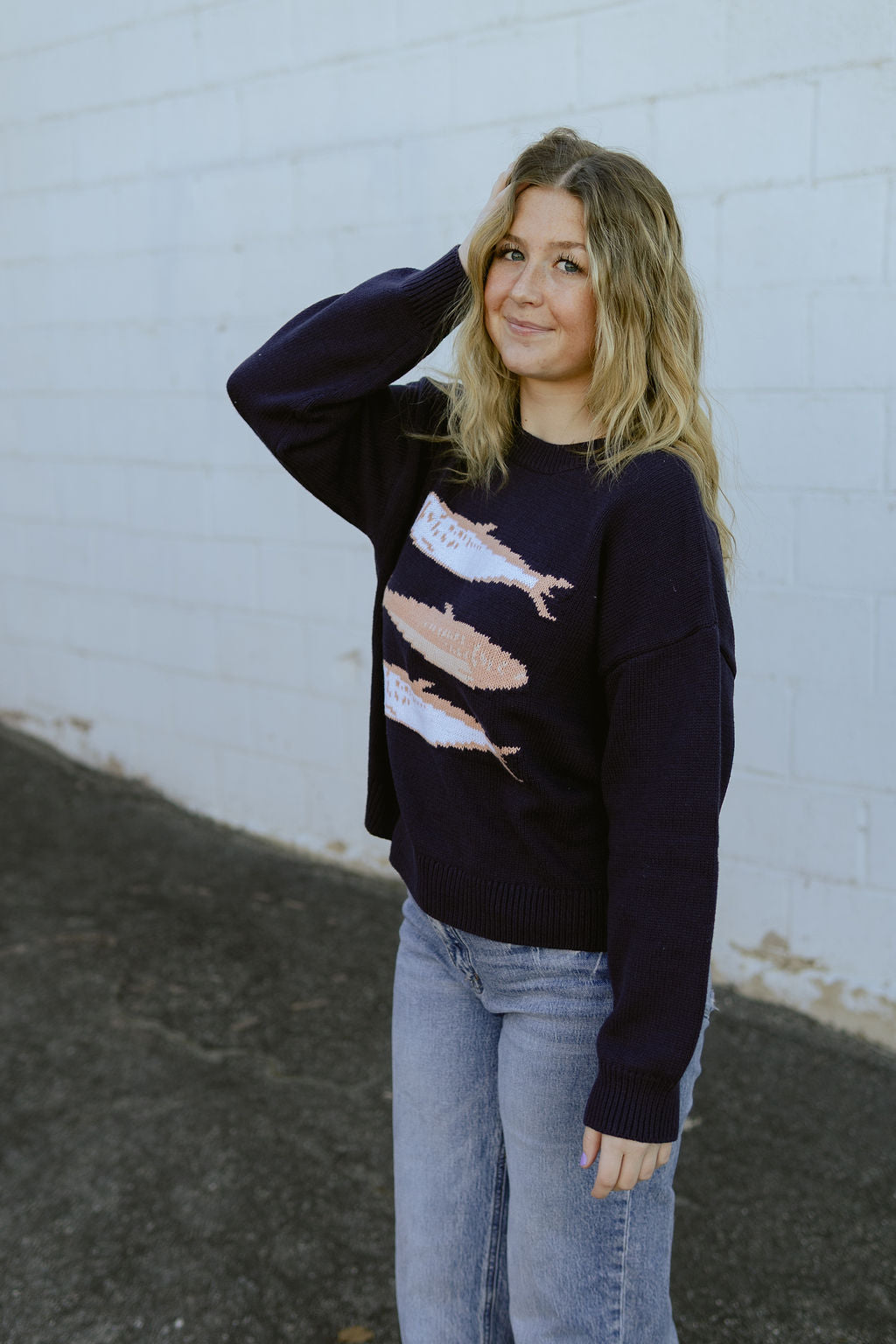 navy sweater with pink sardines