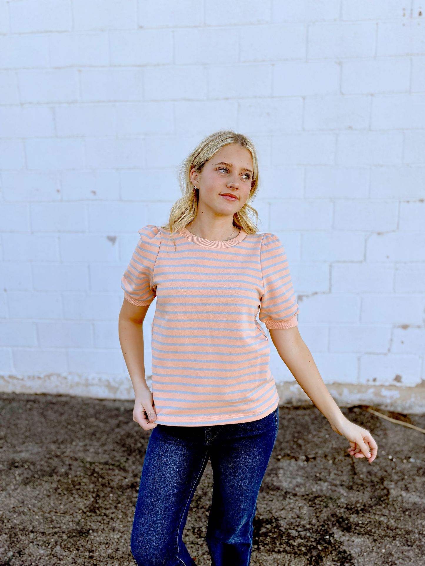 Blush colored tee with grey stripes and puff sleeves