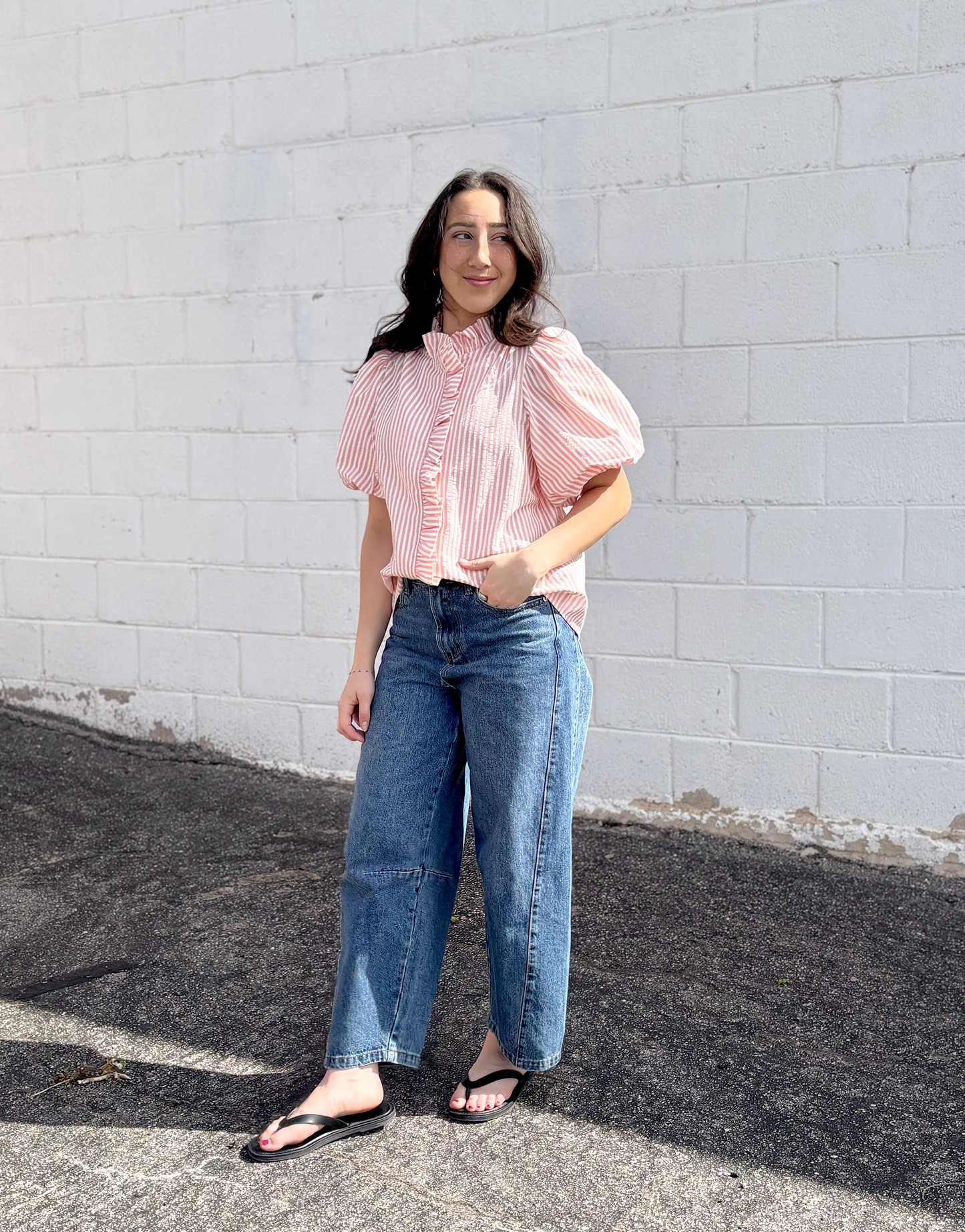 Pink striped button up top with puff sleeves and ruffles up the front and collar
