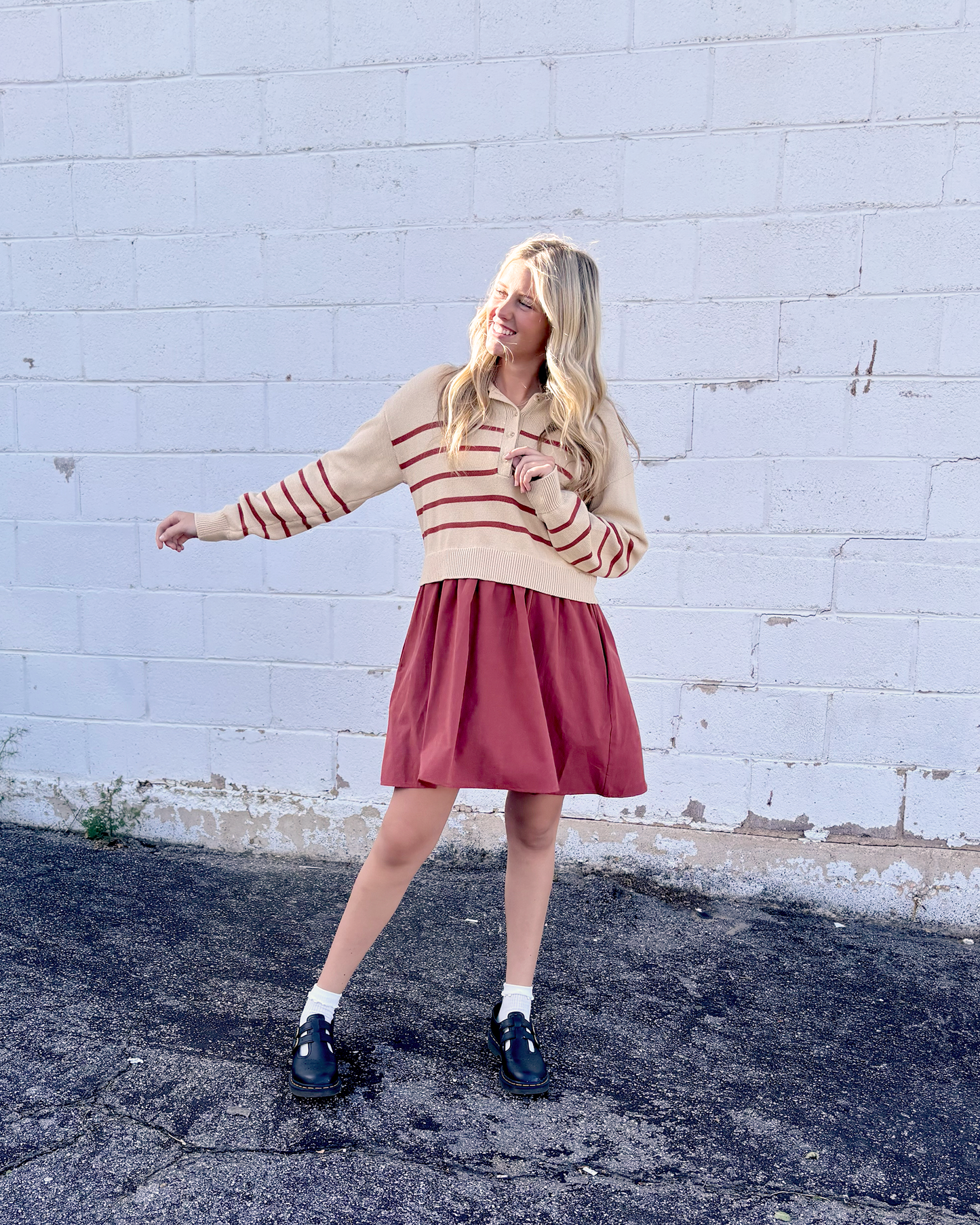 Cute dress with sweater on top and short skirt on the bottom