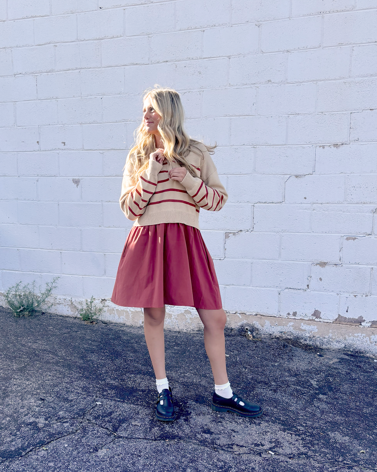 Cute dress with sweater on top and short skirt on the bottom
