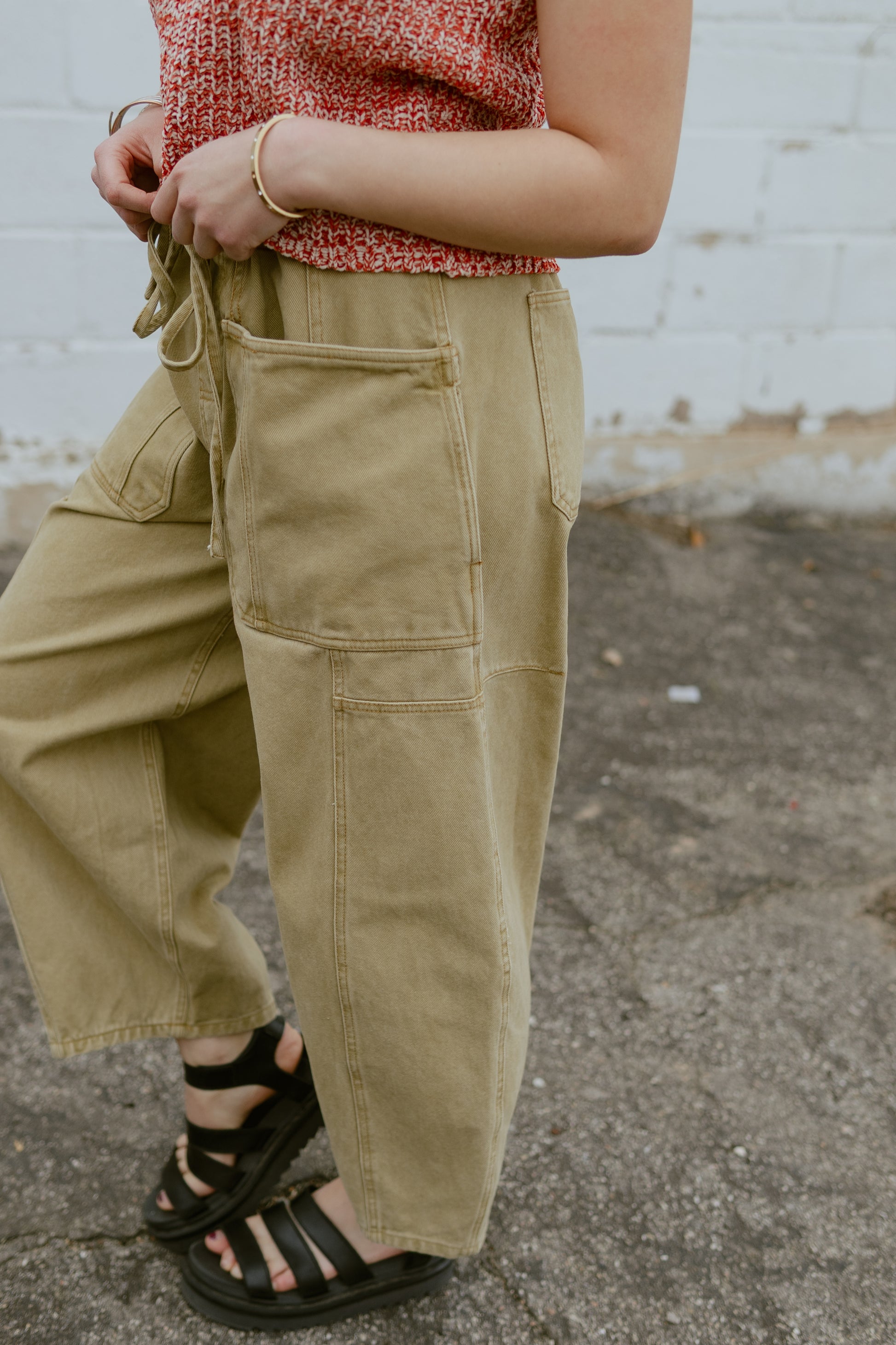 Tan barrel jeans with tie waist