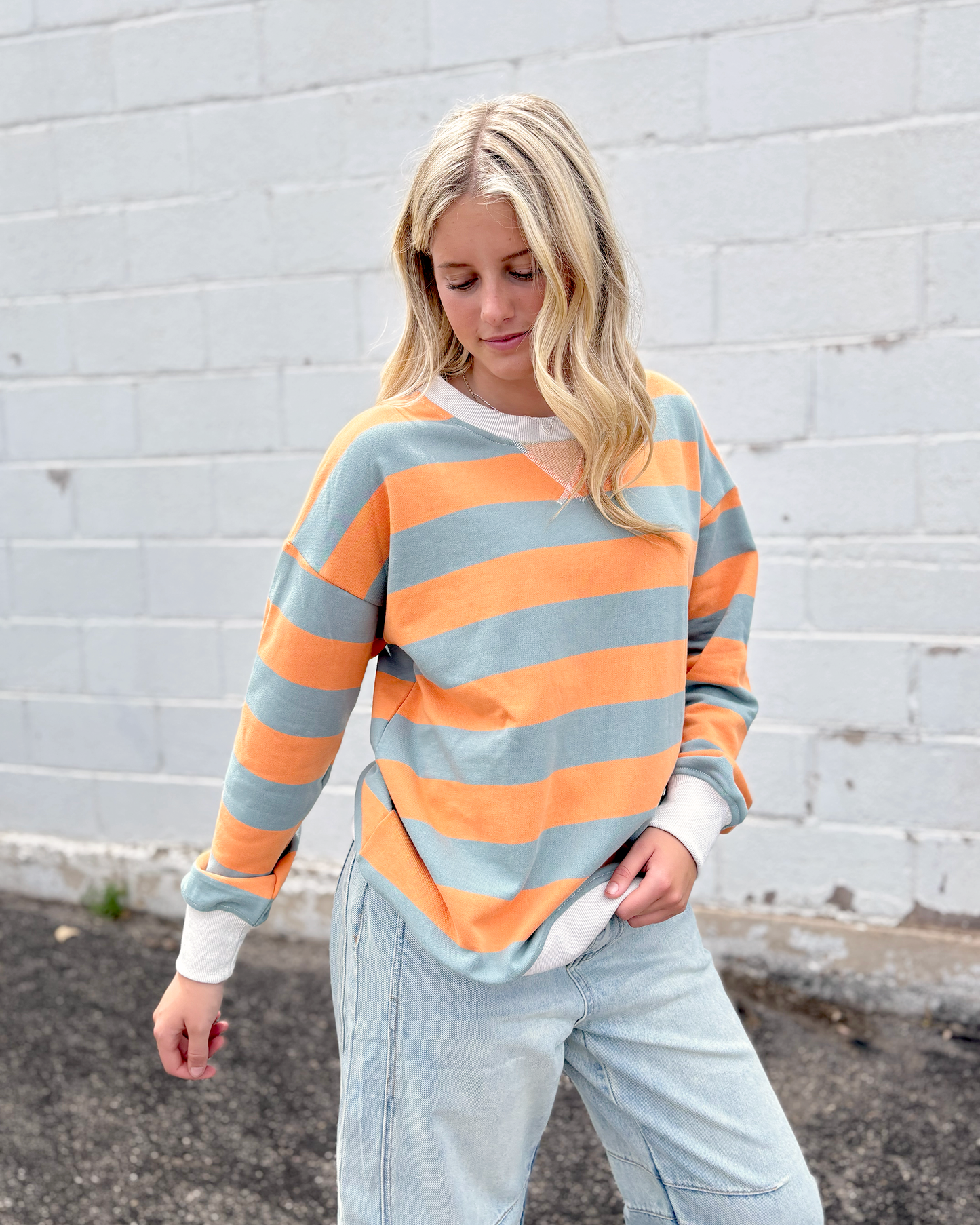 oversized sweater with orange and grey stripes, crewneck