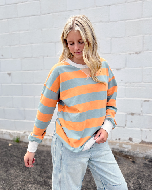 oversized sweater with orange and grey stripes, crewneck
