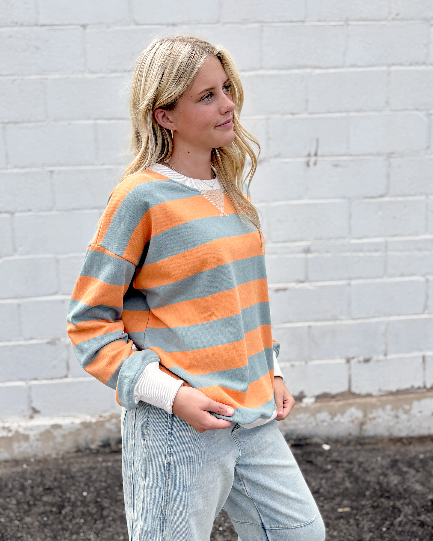 oversized sweater with orange and grey stripes, crewneck