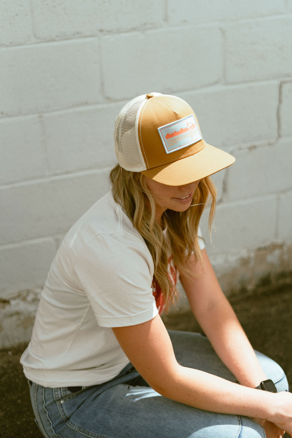 trucker hat in tan and orange