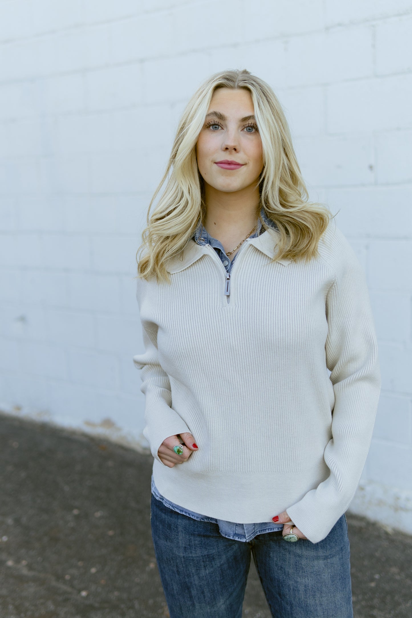 beige v neck zip up sweater