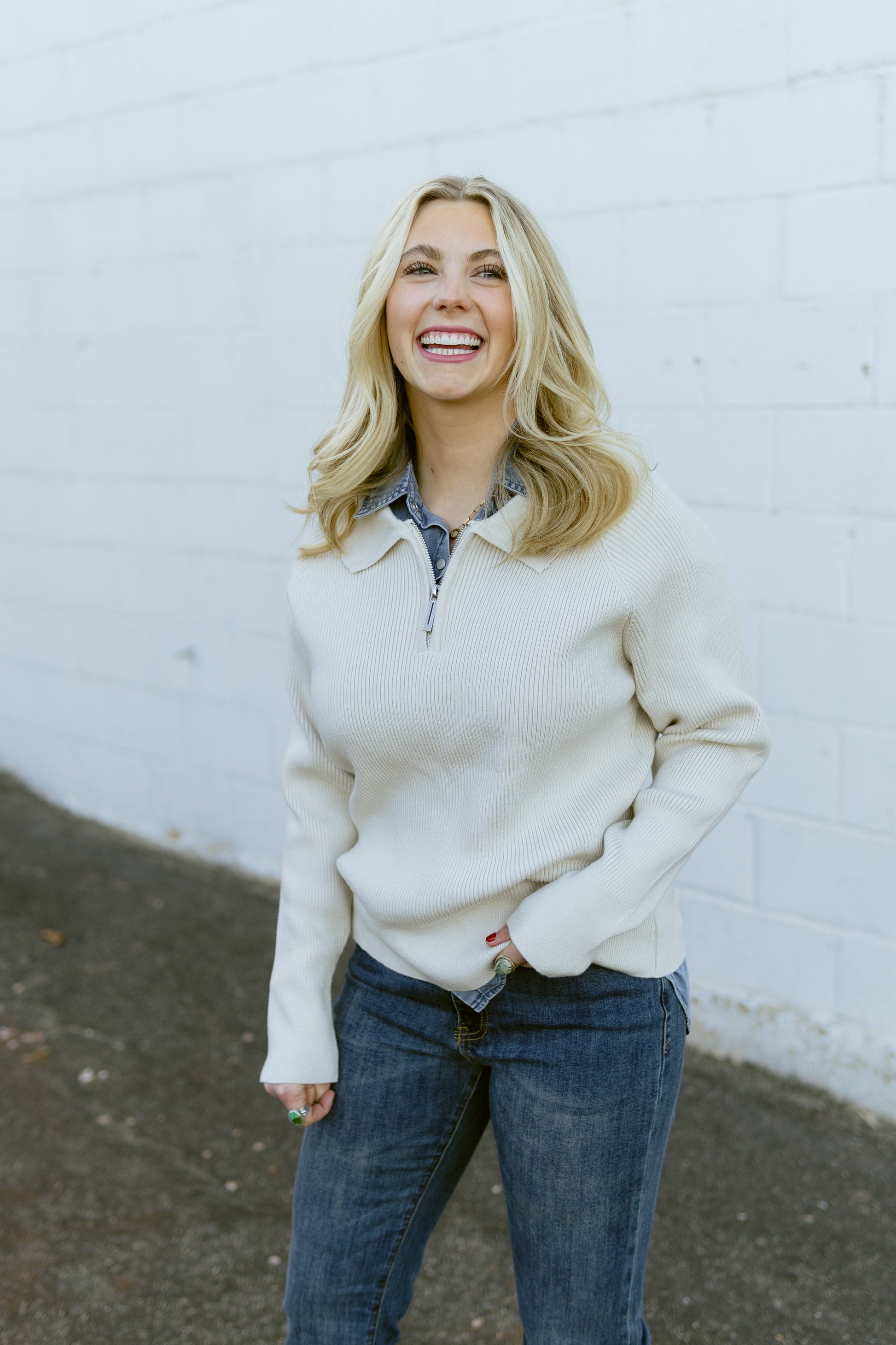 beige v neck zip up sweater