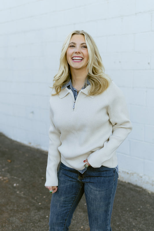 beige v neck zip up sweater