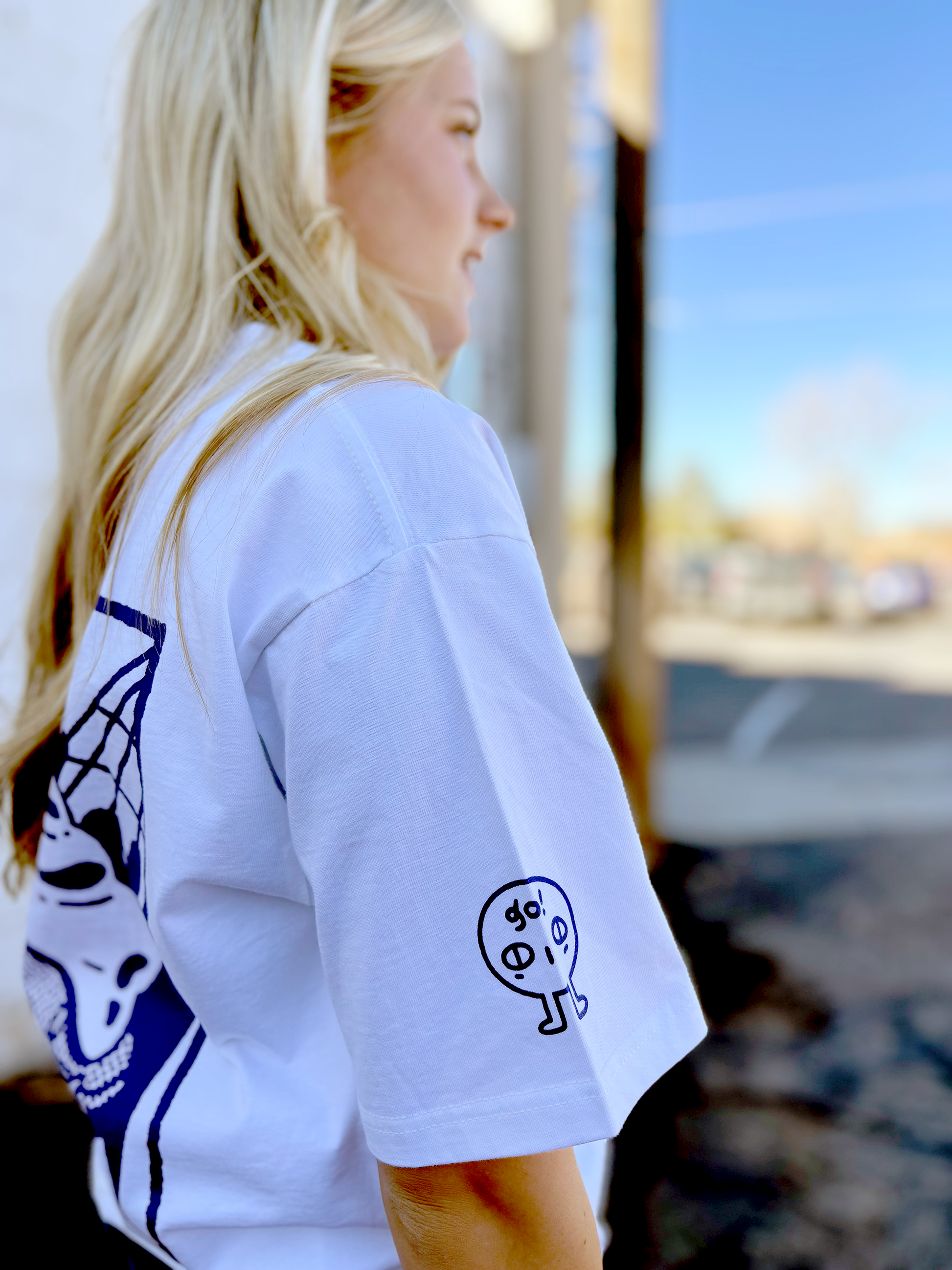 Cute white graphic tee with Japanese character on the front and sleeve and the saying "you add sprinkles to my vanilla days" on the back
