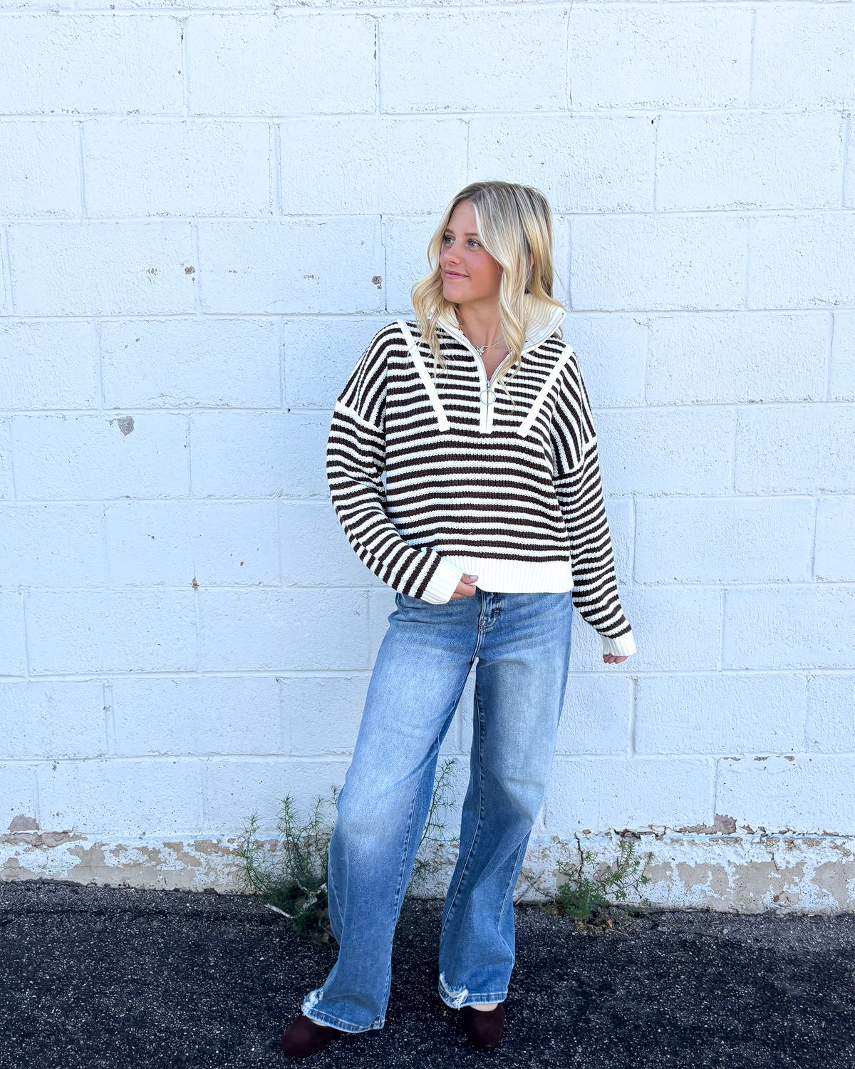 Sweater with mocha colored stripes and a half zip collar