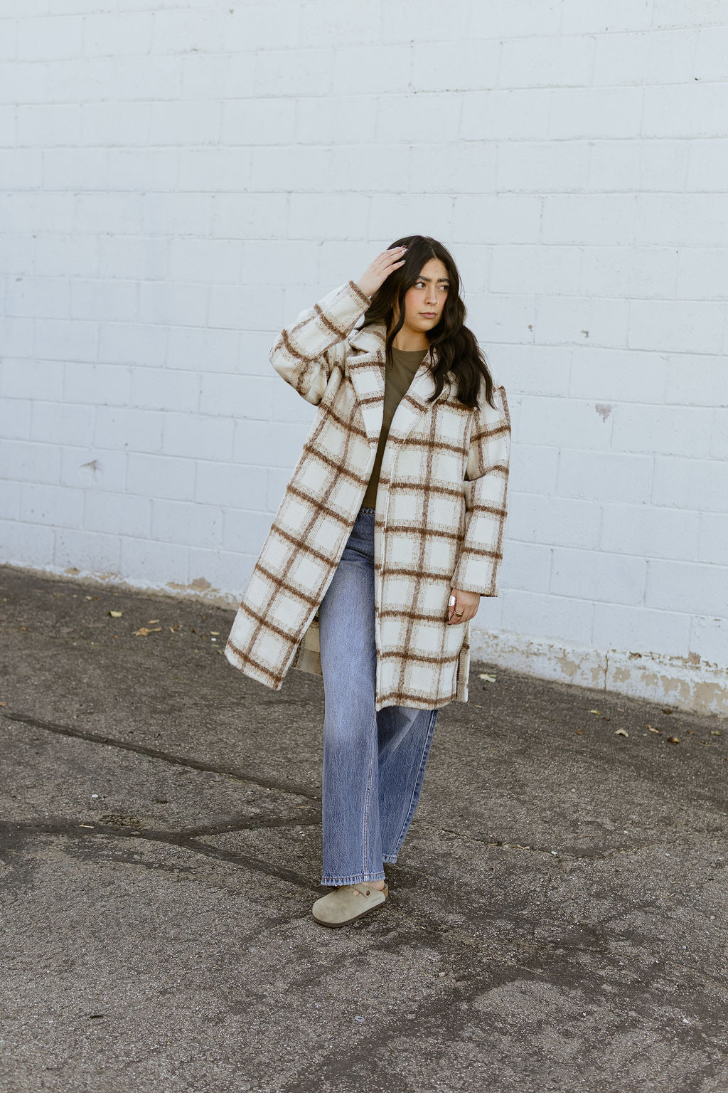 Ivory trench coat with tan plaid lines