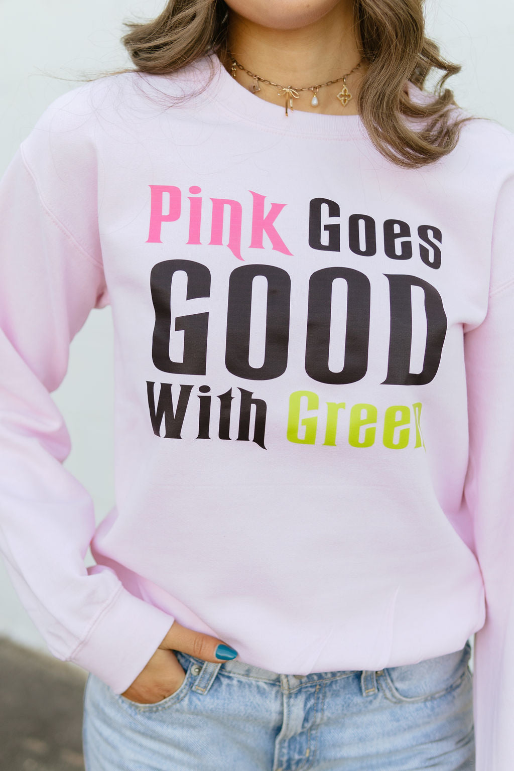 sweatshirt with Wicked quote on the front. Pink goes good with green