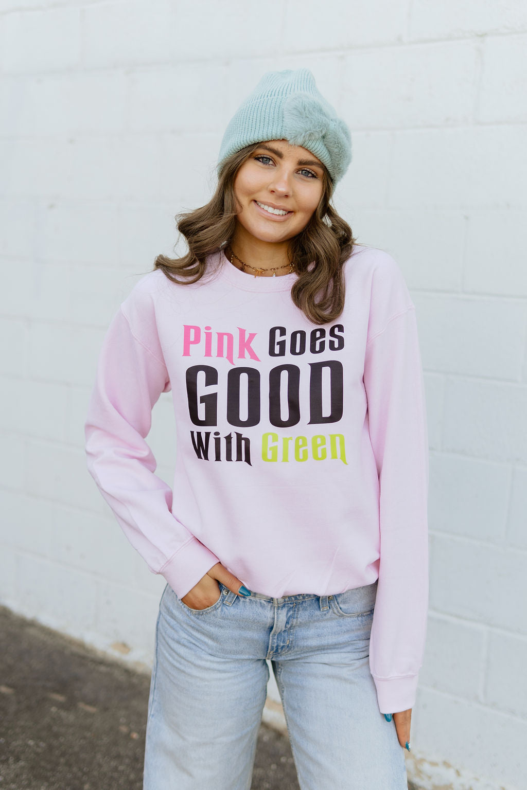 sweatshirt with Wicked quote on the front. Pink goes good with green