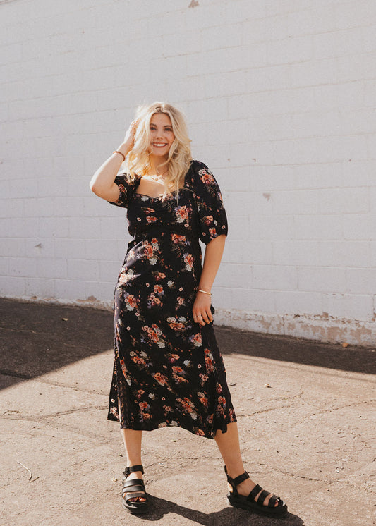 black dress with fall floral pattern and black lace trim