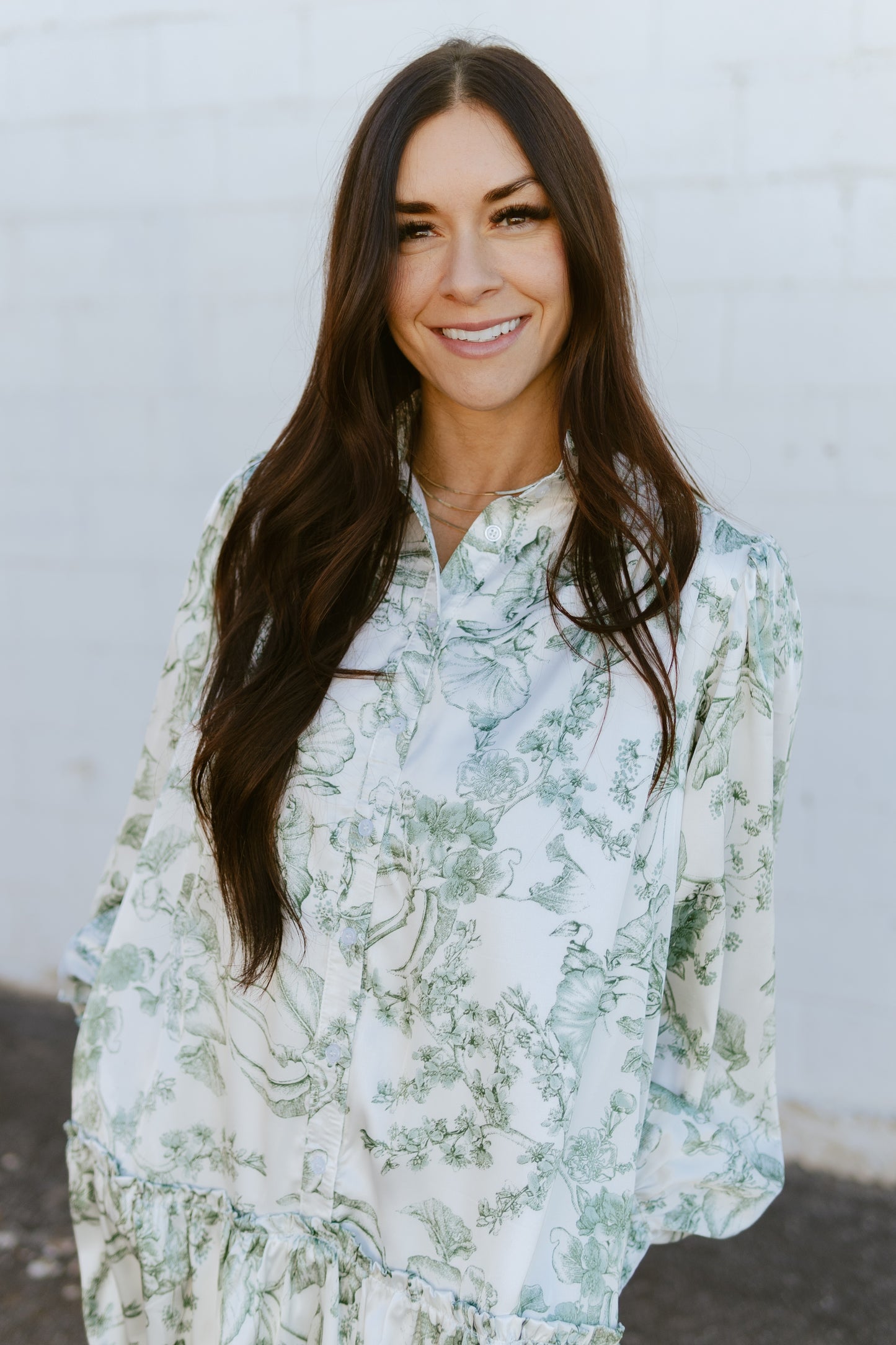 white a-line dress with green floral print