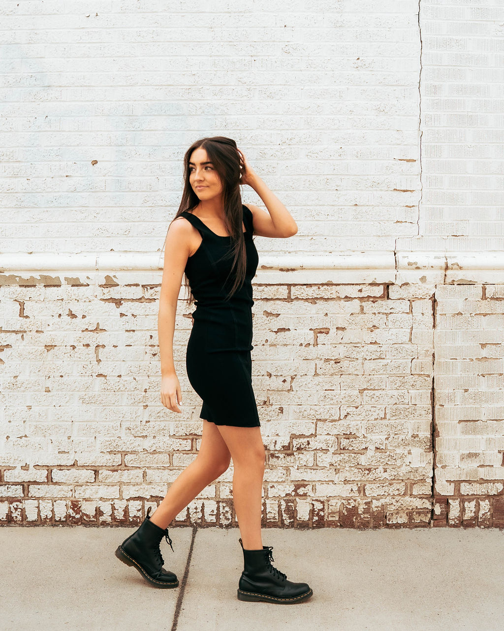 black body con dress paired with combat boots