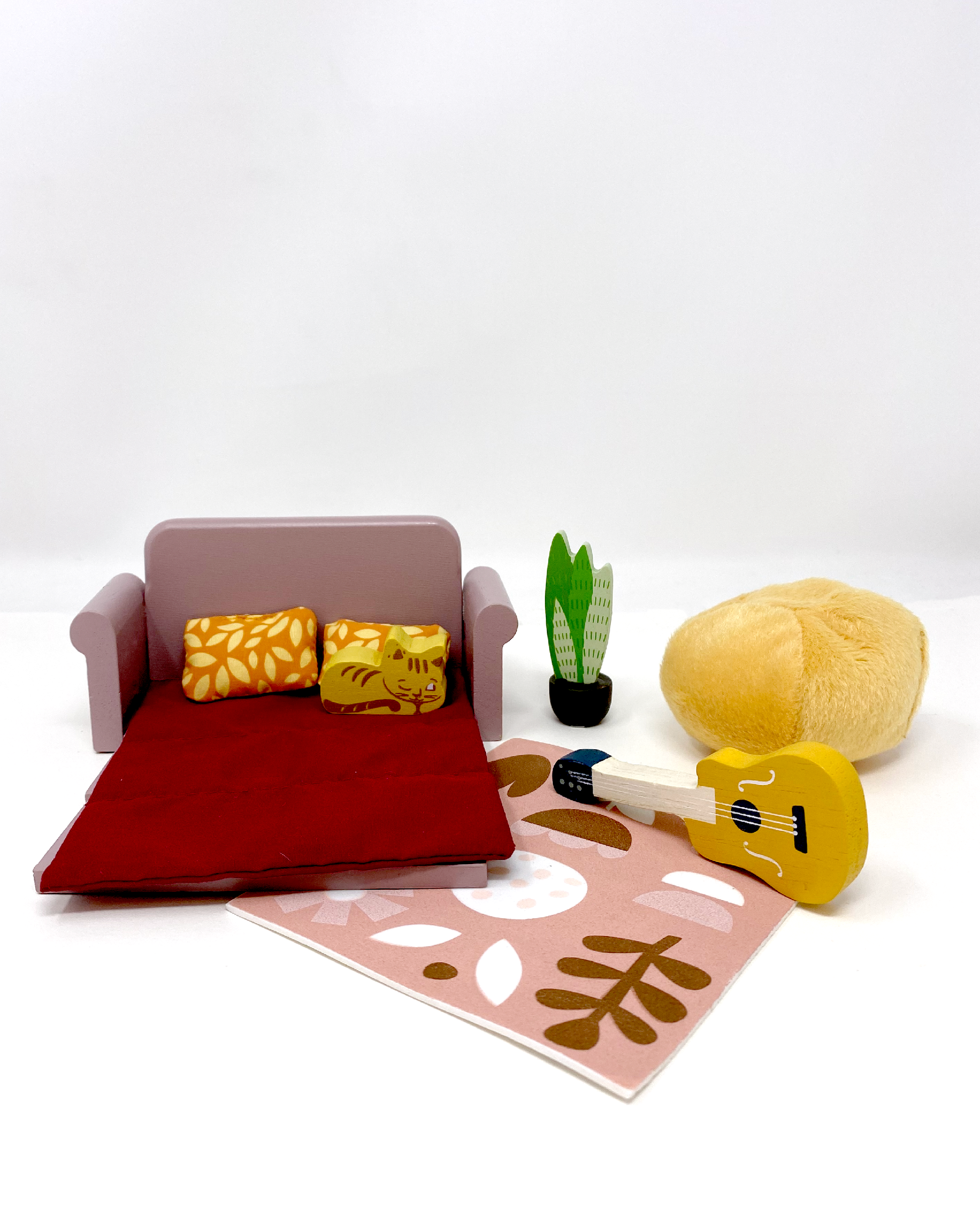 Dollhouse study furniture with clock, beanbag, couch, artist easel, and desk