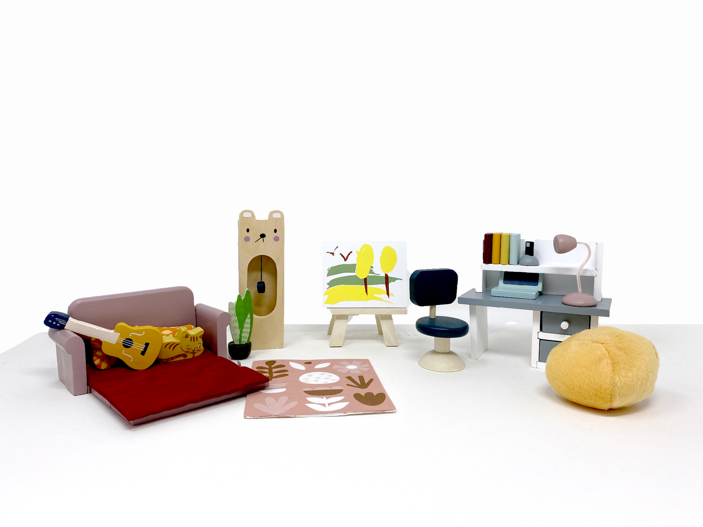 Dollhouse study furniture with clock, beanbag, couch, artist easel, and desk