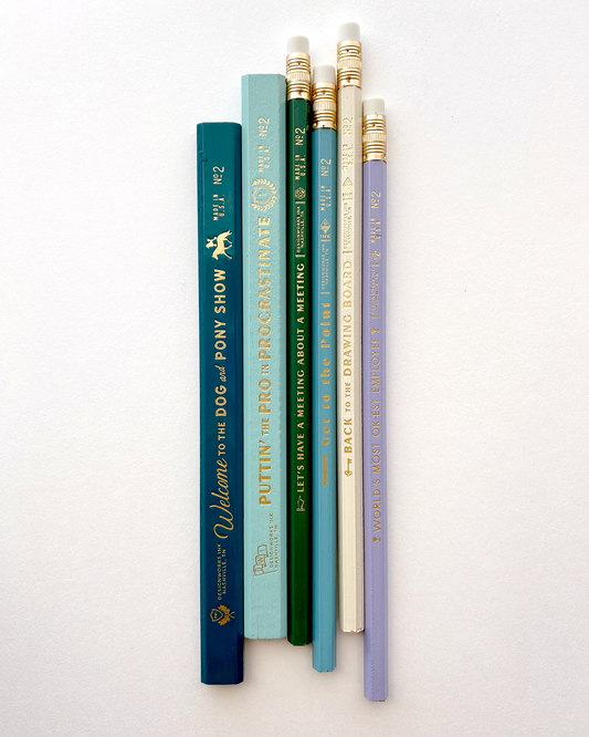 sassy pencil set with workplace shenanigans imprinted in gold on the barrel of each pencil.